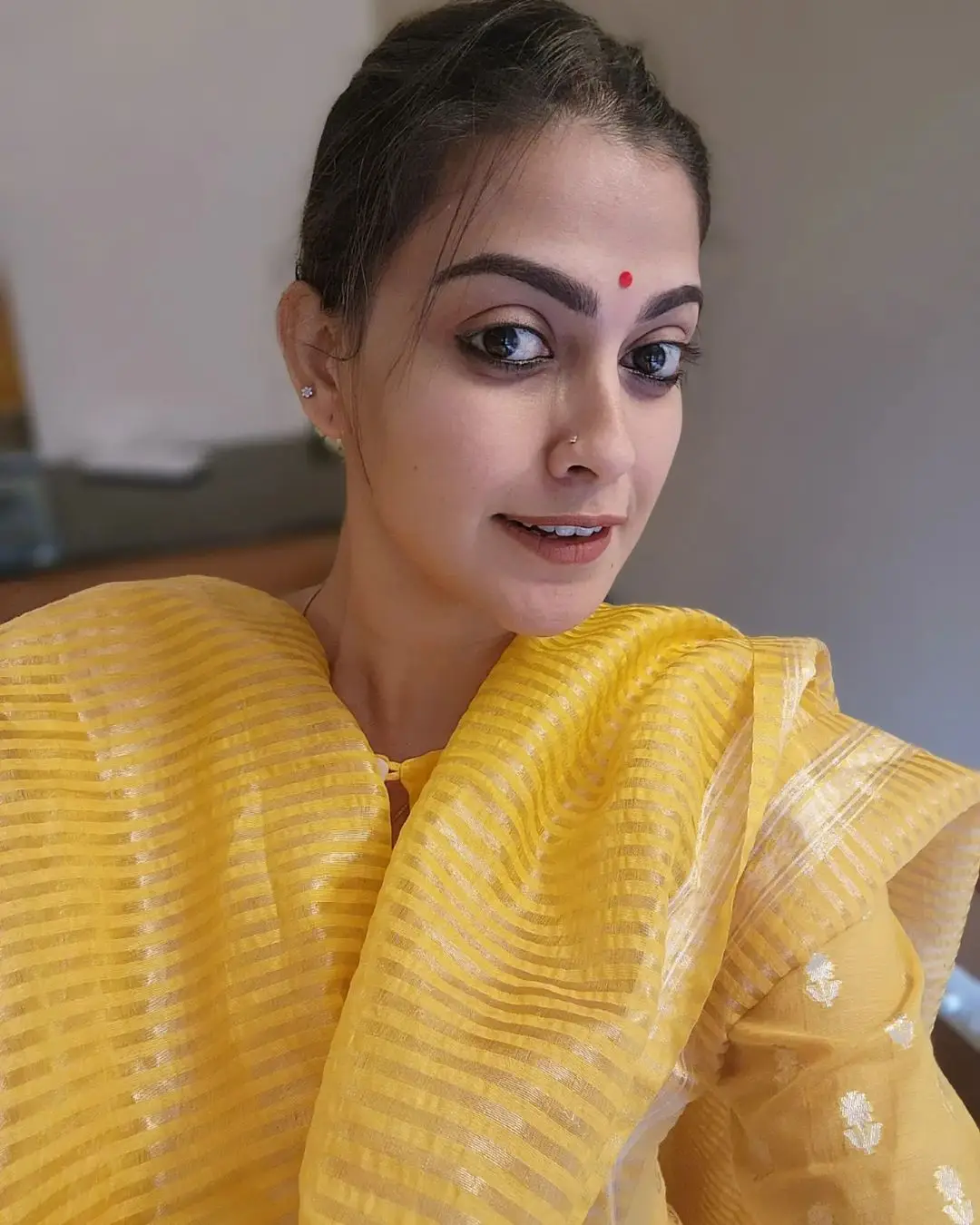 Anusree Nair In South Indian Traditional Yellow Gown